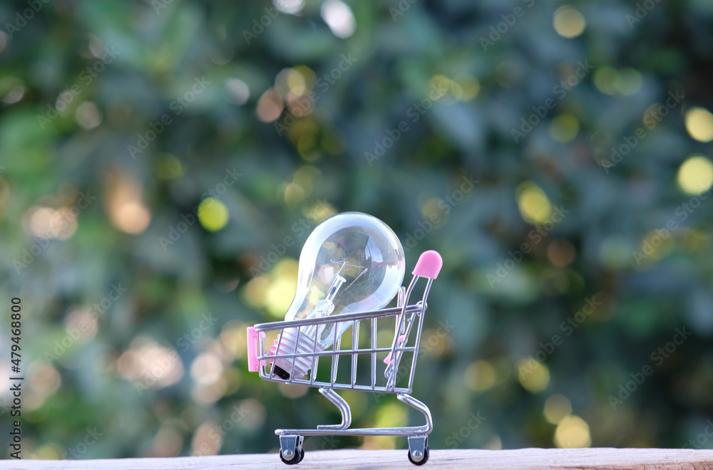 Poster concept of idea, invention, and inspiration with glowing light bulb in hand. you can build a one-of-