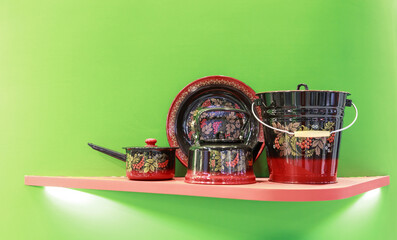 Enameled dishes with Russian traditional folklore Khokhloma painting