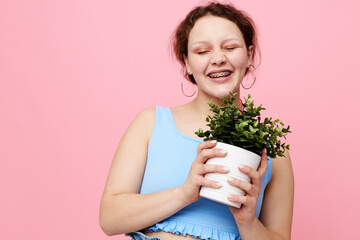 pretty girl potted flower posing plant isolated backgrounds unaltered