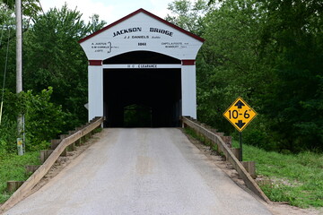 entrance to wooden bridge
