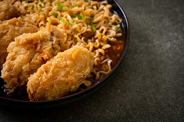 Korean instant noodles with fried chicken or Fried chicken ramyeon