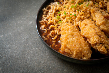 Korean instant noodles with fried chicken or Fried chicken ramyeon