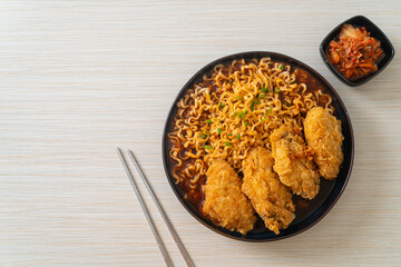 Korean instant noodles with fried chicken or Fried chicken ramyeon