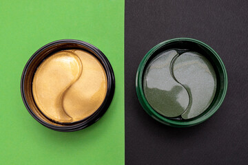 Hydrogel patches eye mask in green and gold colors. view from above. The concept of cosmetology, facial skin care.
