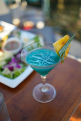 Gala dinner with a glass of red wine, laid table, side view, horizontal