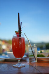 Gala dinner with a glass of red wine, laid table, side view, horizontal