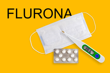 Face masks, thermometer and pills isolated on a yellow background. Covid 19 alpha, beta, gamma,...