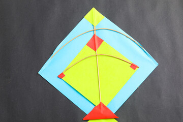 Colorful paper kites and string , Makar Sankranti festival Concept.