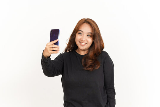 Take A Selfie Using Smartphone Of Beautiful Asian Woman Wearing Black Shirt Isolated On White