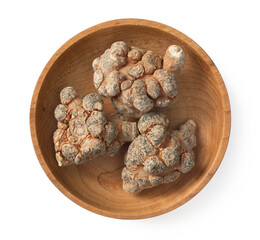 Dried notoginseng in the wooden bowl,  isolated on white background, top view