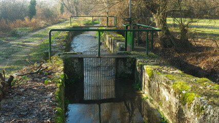 Samll canal feed locks of a river mill