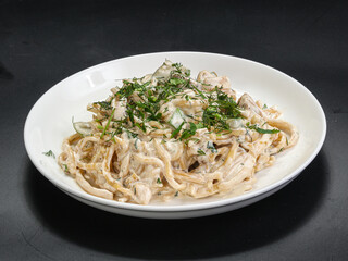 Spaghetti with cream sauce and herbs