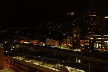 Fototapeta na wymiar Night view of Inasayama Mountain and Nagasaki Station in Nagasaki, Japan - 日本 長崎駅前 街並み 夜景