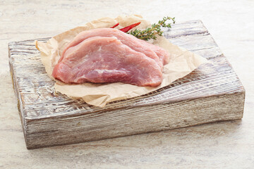 Raw pork schnitzel for roast