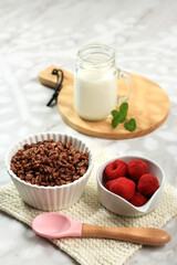 Rice cereal on bowl on white background