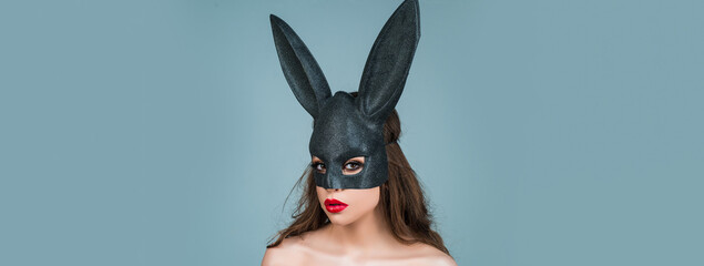 Easter banner with bunny woman. Easter sexy bunny girl. Egg hunt. Woman rabbit mask. Sensual seductive.