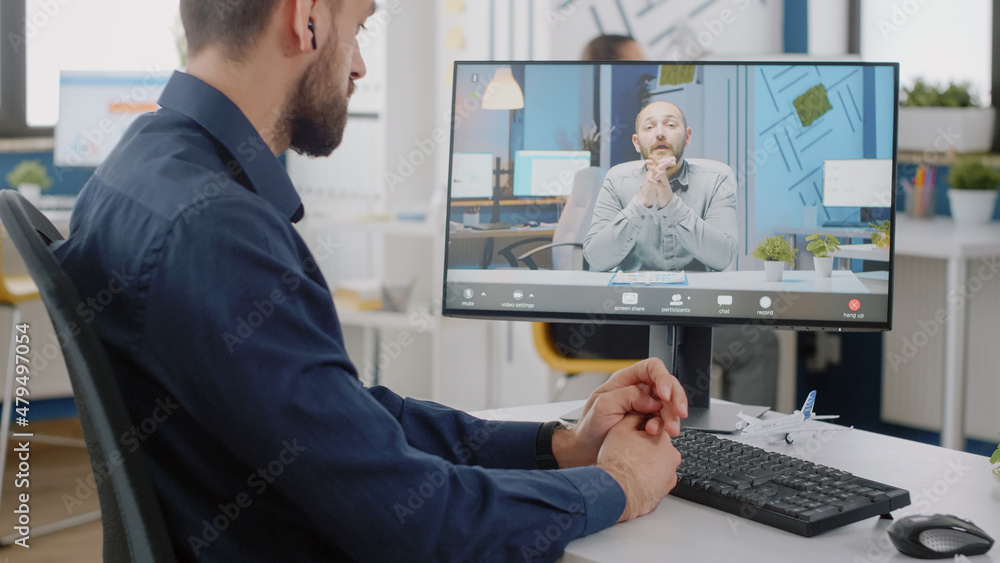 Poster entrepreneur using video call on computer for discussion with manager. engineer talking to trainer a