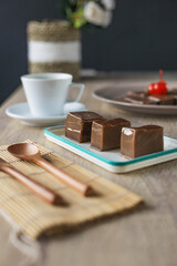 Yokan and matcha tea is japanese deserts served on wooden table