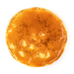 One ancake with caramel sauce  isolated on white background. Sweet pancake top view.
