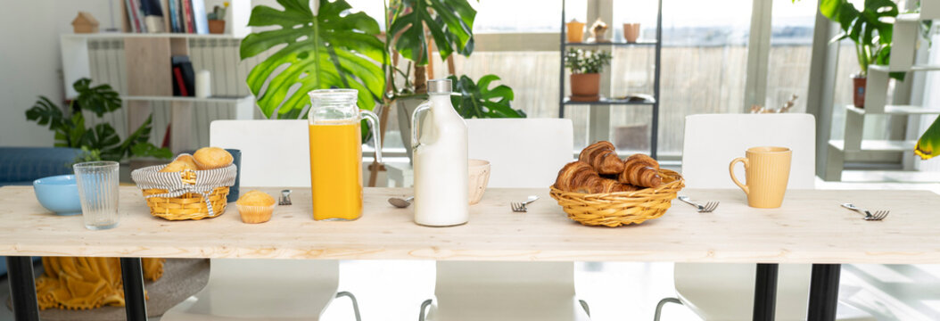 Food and drink on dining table at home