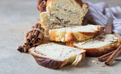 Babka or brioche bread with cinnamon and brown sugar. Homemade pastry for breakfast.