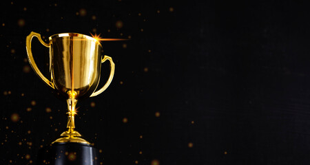 Golden metal glasses on old wooden table background