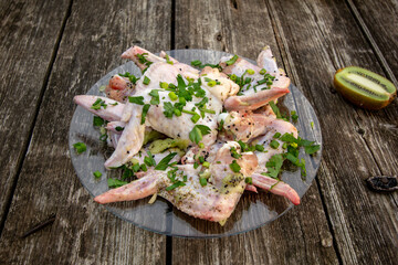 chicken wings in green marinade - kiwi, parsley, dill and chives