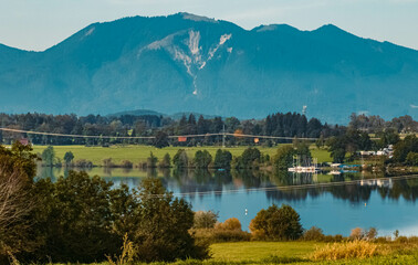 Beautiful alpine summer view with the alps in the background at Aidling near the famous Riegsee lake, Bavaria, Germany