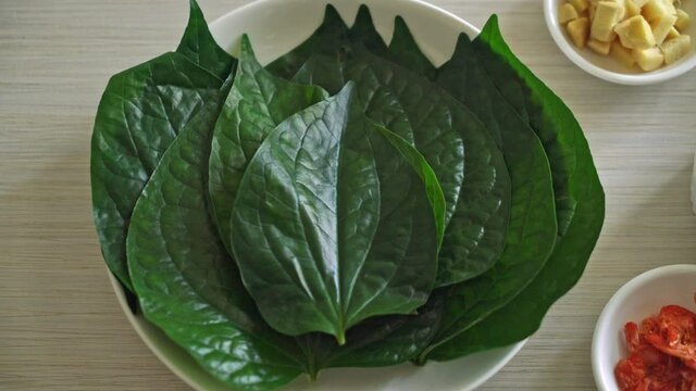 Miang kham - A royal leaf wrap appetizer - It is a traditional Southeast Asian snack from Thailand and Laos