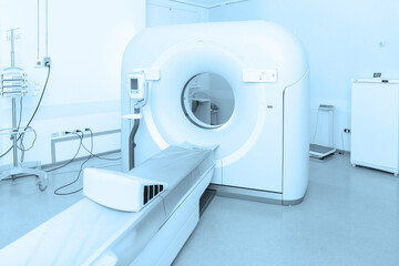 Medical CT or MRI Scan in the modern hospital laboratory. Interior of radiography department. Technologically advanced equipment in white room. Magnetic resonance diagnostics machine