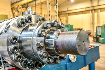 High pressure hydraulic pump in a machine shop repair shop.