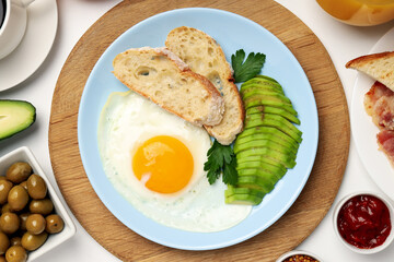 Concept of tasty breakfast on white background