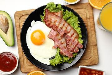 Concept of tasty breakfast on white background