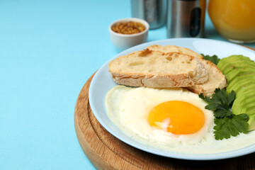 Concept of tasty breakfast on blue background