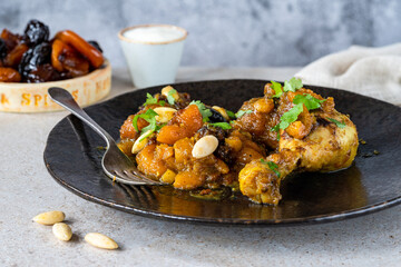 Chicken leg tagine with caramelised prunes and apricots and roasted almonds