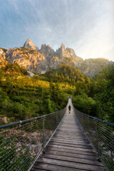 Obraz premium Klausbachtaler Suspension Bridge in Berchtesgarden during Sunrise, Bavaria, Germany