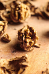 cracked nuts, peeled walnuts, wooden backgorund, organic fruit, healthy