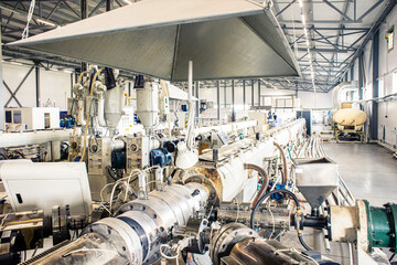 Inside factory. the interior of the equipment used in the polypropylene pipe production line