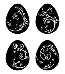 Easter eggs set. Black silhouette with white floral patterns. Paper cutting kit, laser cut out. Template for cutting by plotter. Easter sticker stencil, children tattoo. Vector illustration isolated
