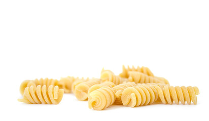 raw pasta spiral on white isolated background