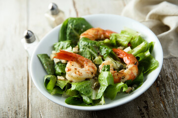 Homemade Caesar salad with shrimps
