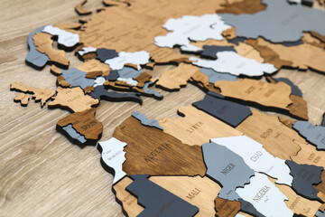 Painted laser cut wooden plywood world map. Political map for the interior.