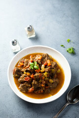 Beef ragout with vegetables and basil