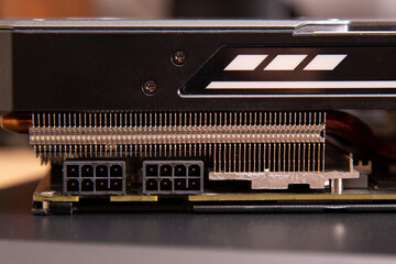 2 ports of 8 pins of power supply of the video card together with a cooling radiator close-up