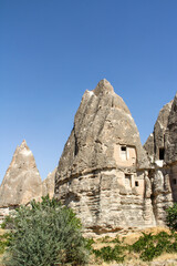 Fototapeta na wymiar Fairy chimneys near Cavusin Town in Cappadocia