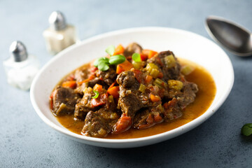 Beef ragout with vegetables and basil