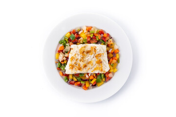 Grilled cod with vegetables in plate isolated on white background. Top view