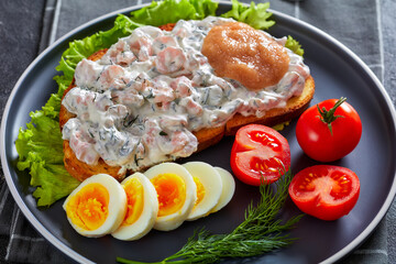 danish smorrebrod with shrimps, mayo, roe, and egg