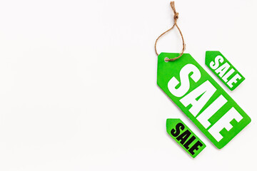 Price sale label tied with string. Discount shopping day concept