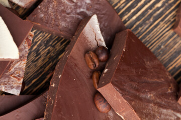 coffee and pieces of milk chocolate from cocoa